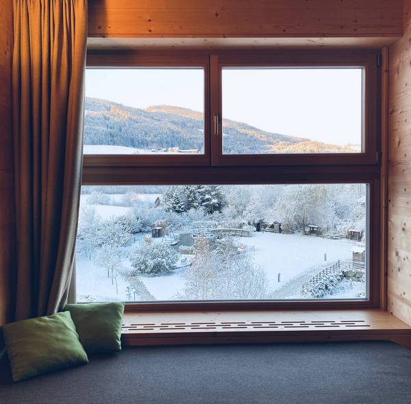 Blick auf das verschneite Paradiesgart'l im Molzbachhof