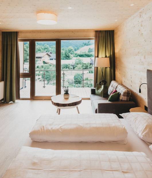 Zimmer Baumgeflüster im Holzhotel Molzbachhof