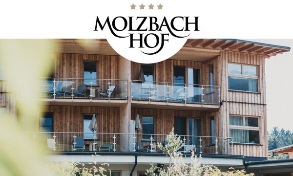 Außenansicht des Holzhotel im Molzbachhof